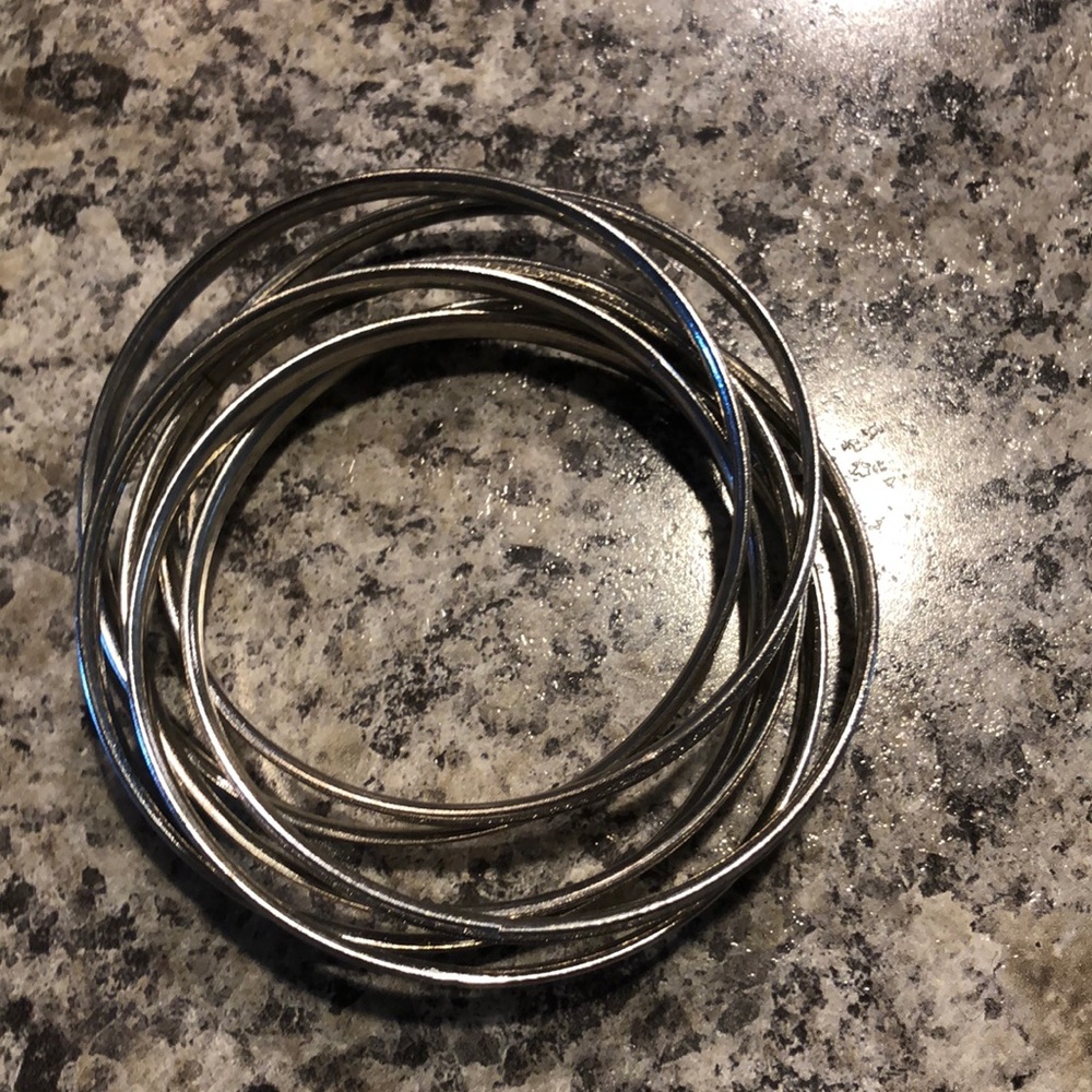 Stack of silver linked bracelets - Picture 1 of 4